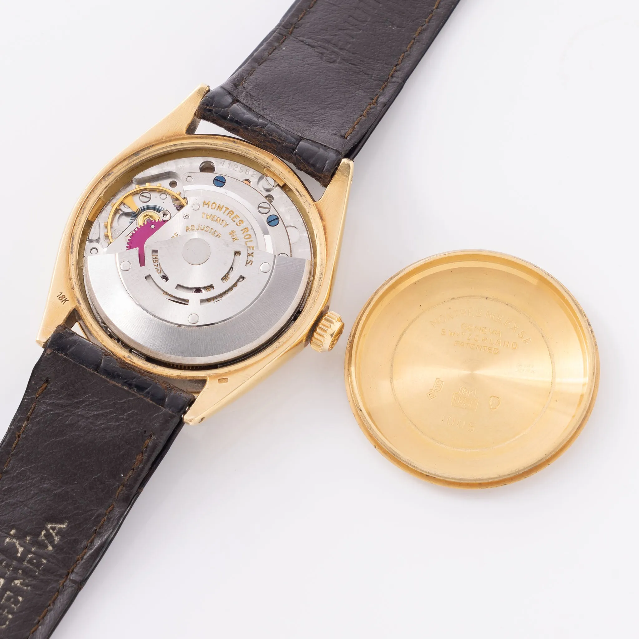 Rolex Oyster -Perpetual  silver "25 years Coca Cola service " logo dial   in 18 k yellow gold  with original double punched papers ref 1003